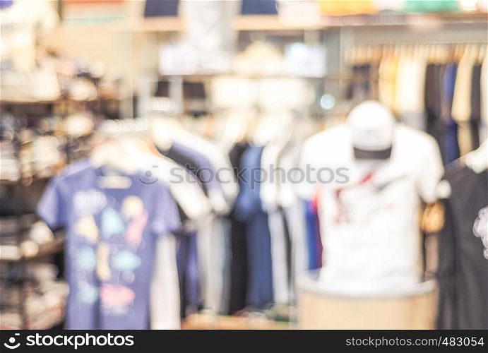Blurred background, blur display clothing at store with bokeh light, fashion and business background