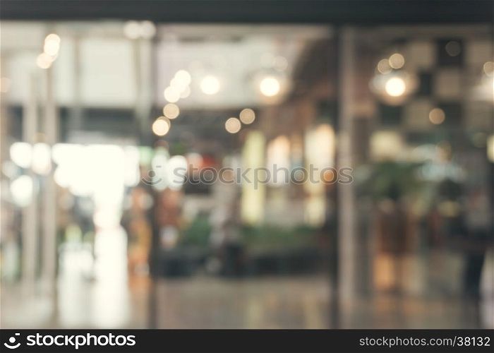 Blurred background - Coffee shop blur background with bokeh. Vintage filtered image.