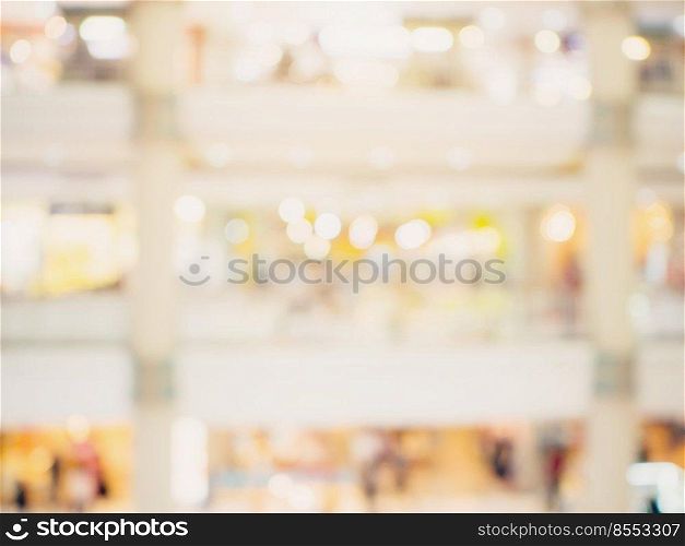 Blurred background image. shopping mall blur background with bokeh and vintage toned.