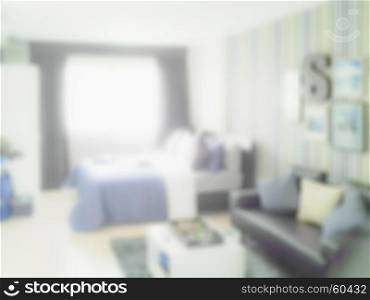 Blurred background modern bedroom with sofa