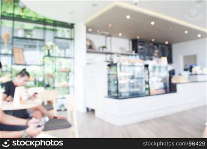 Blurred background of cafe or restaurant interior with people