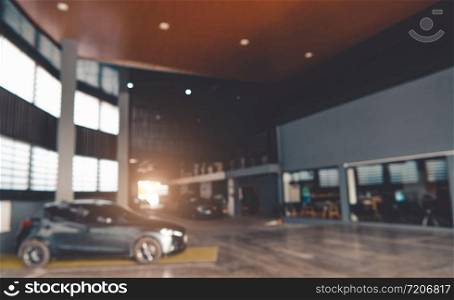 Blurred background of car showroom garage. Automotive car and business transportation concept. Abstract background.