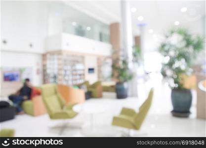 Blurred background of modern white and clear showroom or cafe