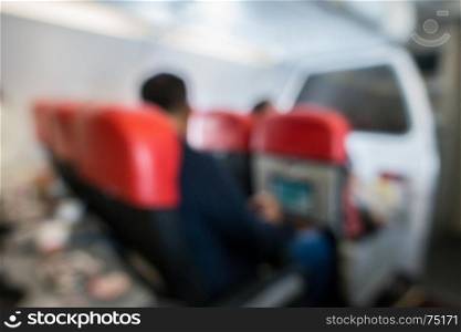 Blurred background of Traveller in commercial airplane