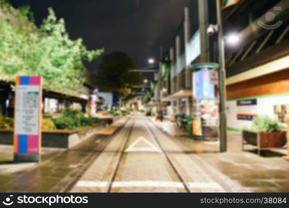 Blurred background - Street night city lights blur. Retro toned photo, Vintage filtered image.