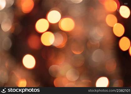 Blurred background sunset with bokeh sun light. Yellow bokeh background. Abstract blur golden bokeh lighting. Bokeh backgrounds yellow