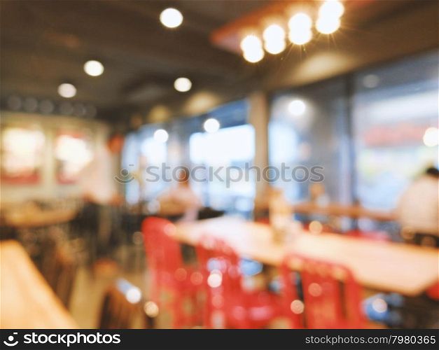 Blurred background : Vintage filter of customer in coffee shop blur background with bokeh&#xD;