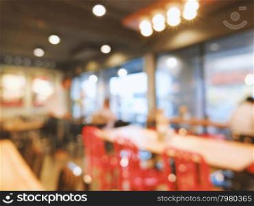 Blurred background : Vintage filter of customer in coffee shop blur background with bokeh&#xD;