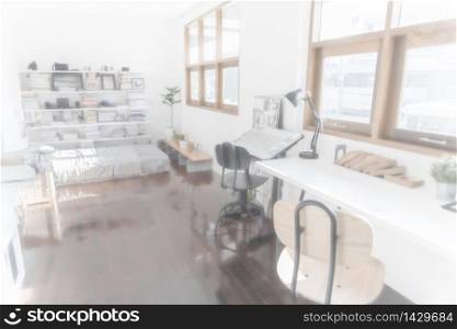 Blurred background white cozy room interior design bright furniture in apartment. Blurry white living room