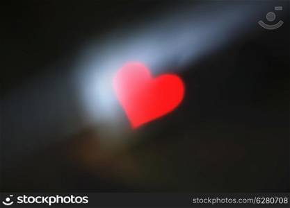 Blurred background with red heart
