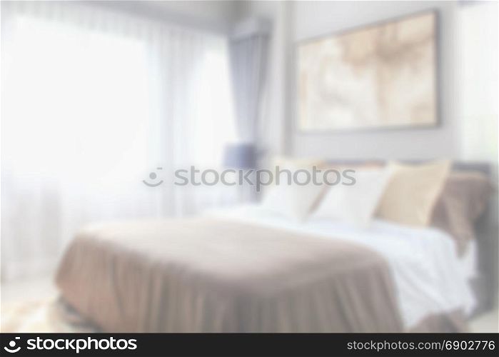 Blurred bedroom with bed