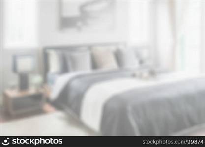 blurred bedroom with modern bedroom in black and white color tone