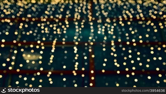 Blurred bokeh background. Beautiful background from blurred lights of interior. Color toned