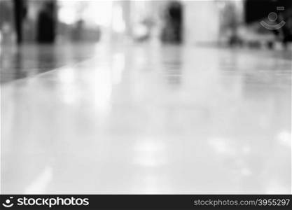 Blurred bokeh background. Beautiful background from blurred lights of interior. Grayscale image