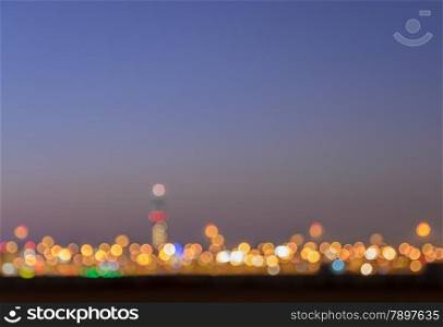 Blurred bokeh city lights abstract at twilight