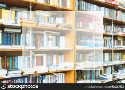blurred bookshelf in library for your background design