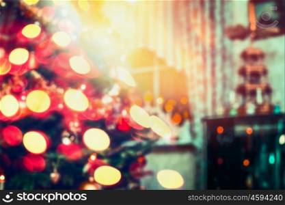 Blurred Christmas background, home scene in room with Christmas tree and holiday bokeh lighting