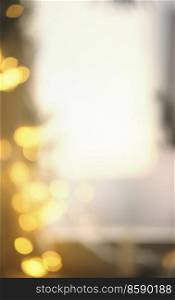 Blurred Christmas bokeh background with yellow light at window. Front view with copy space.