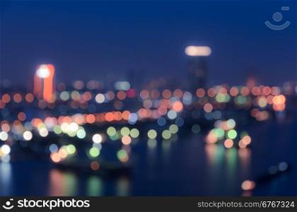 Blurred city lights bokeh illuminate at night