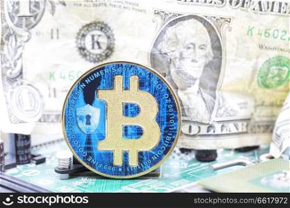 blurred crumpled dollar money and different bitcoin in the motherboard of a pc background like concept of problem and future
