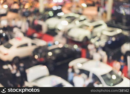 Blurred dealership store, with the cars and soft lightning