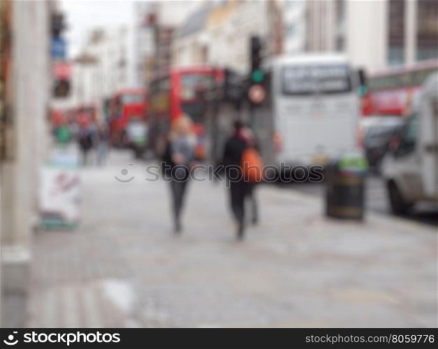 Blurred defocused background. Defocused blur of unrecognisable people useful as a background