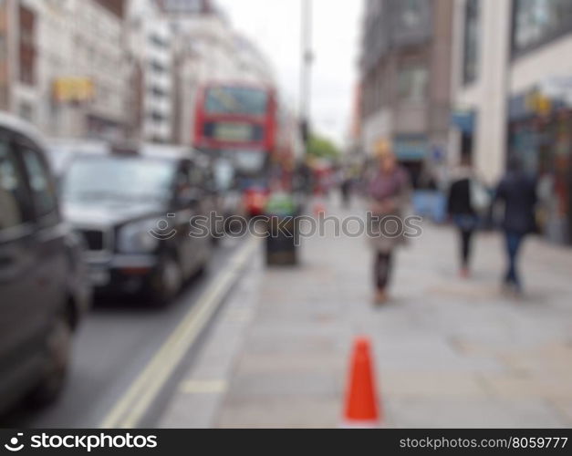 Blurred defocused background. Defocused blur of unrecognisable people useful as a background