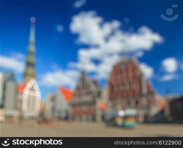 Blurred defocused background of european town - Riga Town Hall Square, House of the Blackheads and St. Peter&amp;#39;s Church, Riga, Latvia