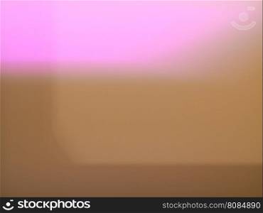 Blurred defocused background. Pink and brown defocused blur useful as a background