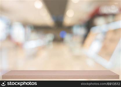 blurred, defocused convenience store with wooden shelf