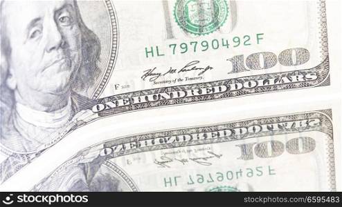 blurred dollar money background and mirror like concept of success prosperity and business
