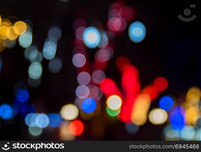blurred electric lights of night pride, round bokeh