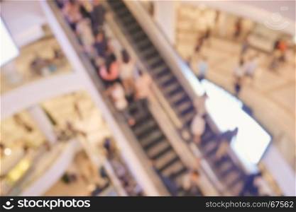 Blurred empty escalator in shopping mall