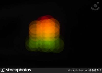 Blurred equalizer bars - abstract colorful dots. In green, yellow, orange and red colors.