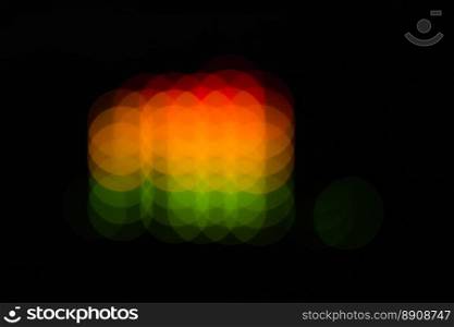 Blurred equalizer bars - abstract colorful dots. In green, yellow, orange and red colors.