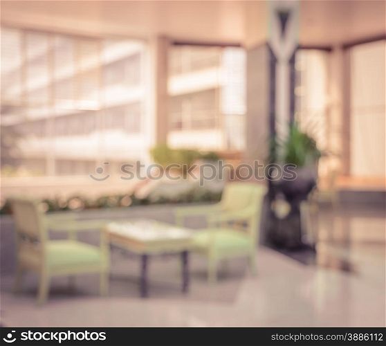 Blurred image background of indoor living room in vintage color style