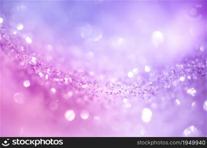 Blurred image Purple glitter vintage lights background defocused for festivals and celebrations