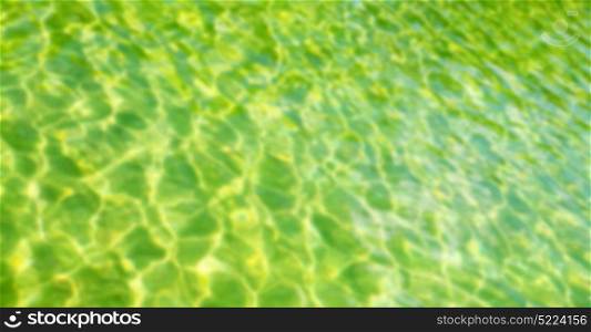 blurred in colors abstract texture of a water in a natual iran pool