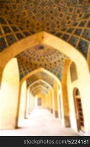 blurred in iran shiraz the corridor passage old mosque and wall arch for islm religion