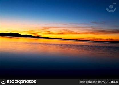 blurred in morocco africa the sunlight of sunset a lake near desert