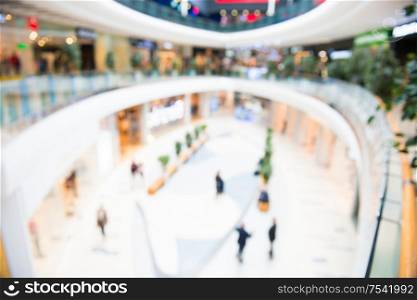 Blurred interior of luxury mall or shoppin center