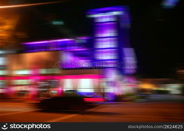 Blurred night colorful motion lights in Miami Beach downton