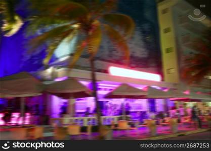 Blurred night colorful motion lights in Miami Beach downton