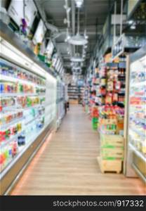 Blurred of product shelves in supermarket or grocery store, use as background