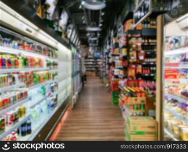 Blurred of product shelves in supermarket or grocery store, use as background