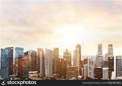 Blurred panoramic view of Singapore downtown and skyline at sunset.. Singapore panoramic view