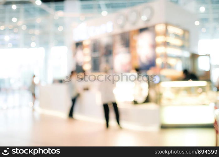 Blurred people background : blur people at cafe with bokeh light background, banner, food and drink concept