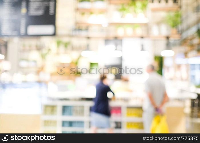 Blurred people background : blur people at cafe with bokeh light background, banner, food and drink concept