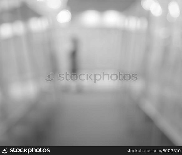 Blurred person in art gallery. Abstract exhibition show background image.