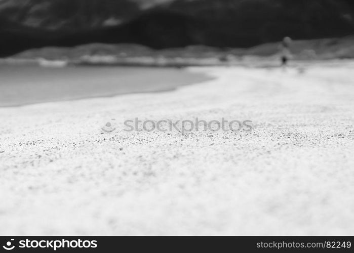 Blurred person on the sandy beach bokeh background. Blurred person on the sandy beach bokeh background hd